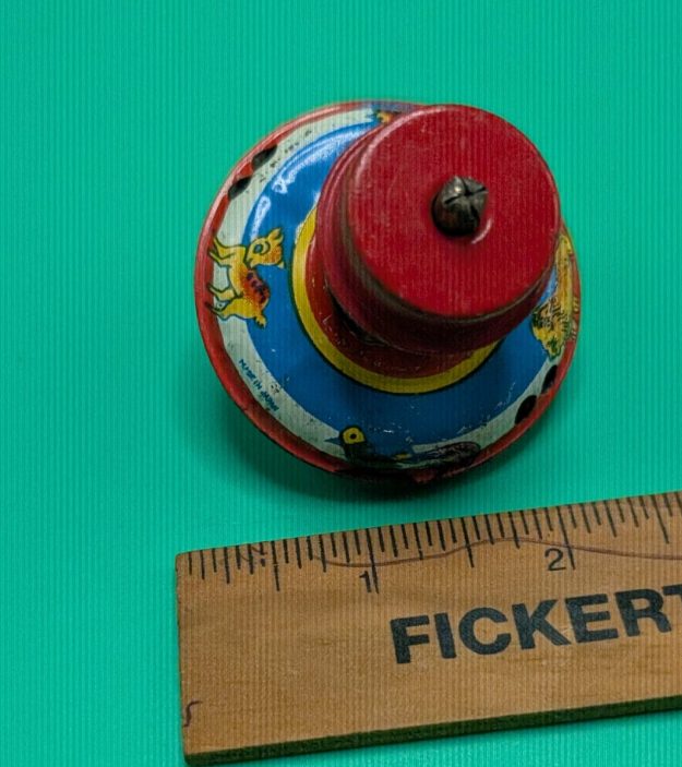 cropped-PXL_20260928_185051017-scaled-2.jpg Vintage Tin Litho Spinning Top - Image 1